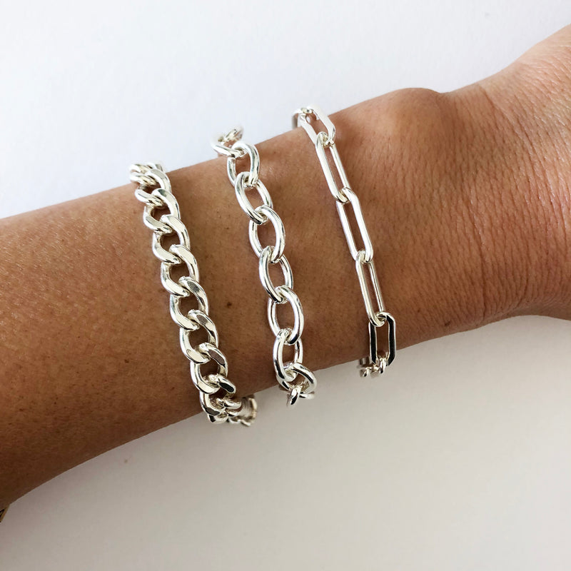 Bold oversized chain link bracelets great for wearing alone or stacking with other bracelets and watches. Paperclip chains, curb chains, and cable chains,...we've got you covered. Sterling silver, gold, & gold fill.