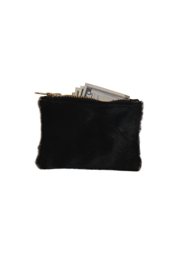 BLACK HAIR ON SMALL POUCH